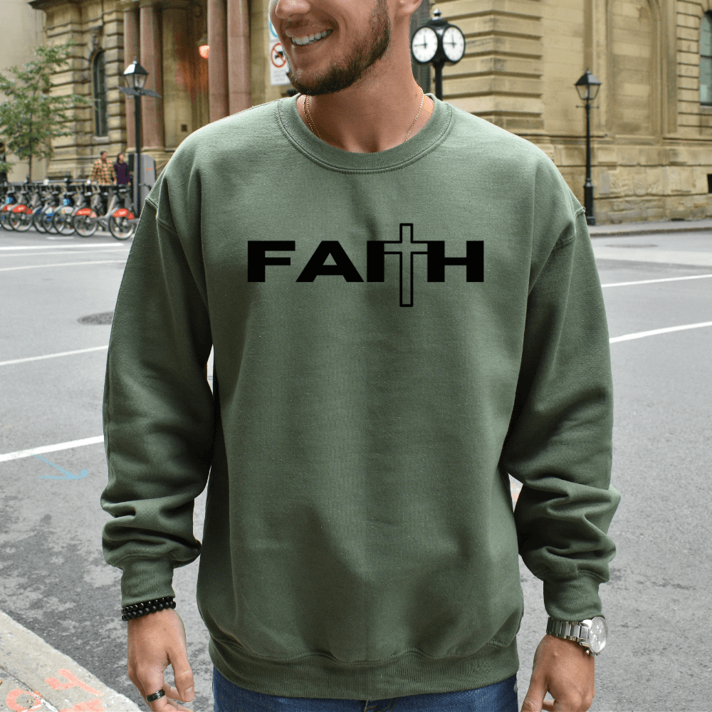 Faith Sweatshirt crewneck military green. On the front chest is printed "FAITH" in black with a cross as the "T"