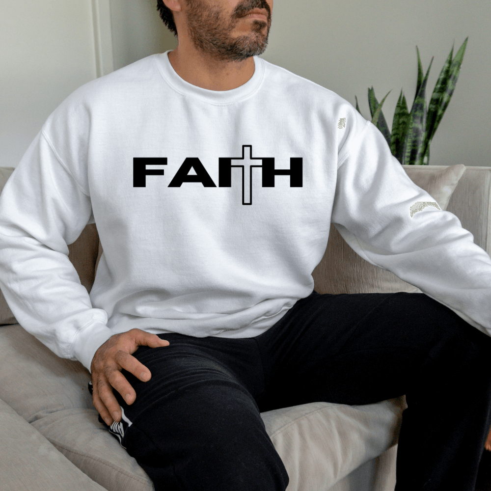 Faith Sweatshirt crewneck white. On the front chest is printed "FAITH" in black with a cross as the "T"