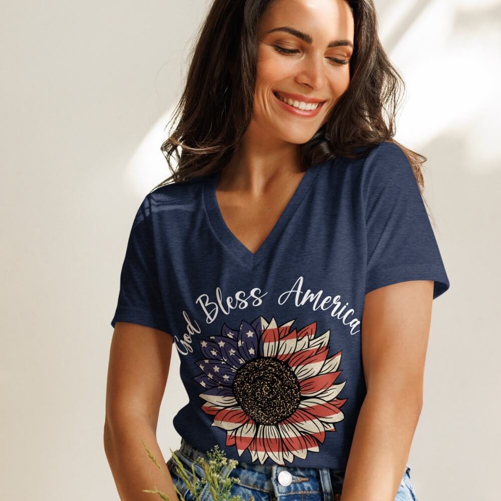 God Bless America V-neck women's t-shirt heather navy.  American Flag colored sunflower printed on front chest below "God Bless America" in white.