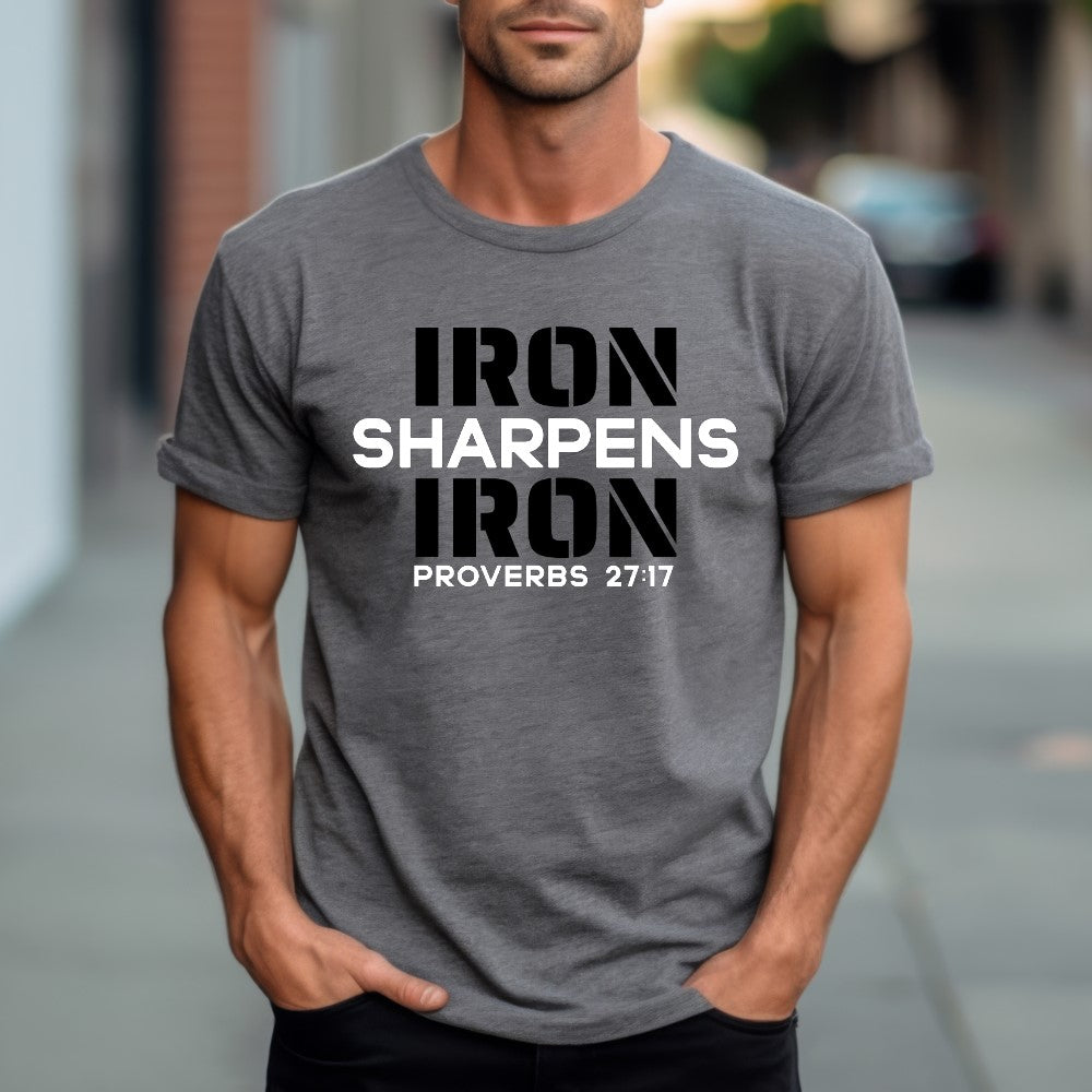 Unisex Iron Sharpens Iron T-shirt graphite heather color. "Iron Sharpens Iron Proverbs 27:17" design printed on front in white and black.