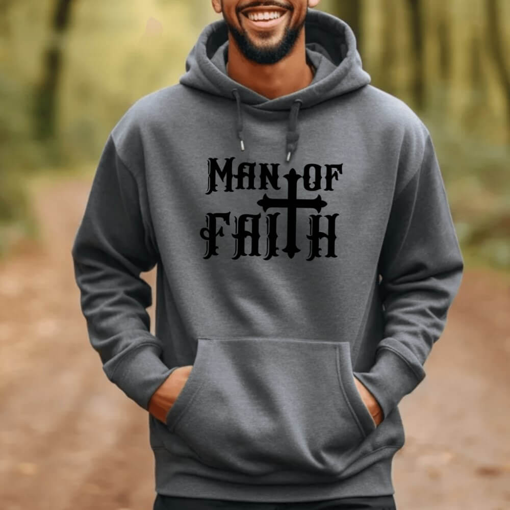 Man of Faith Hoodie dark heather. On the front chest is printed "Man of Faith" in black font with a cross as the "t".
