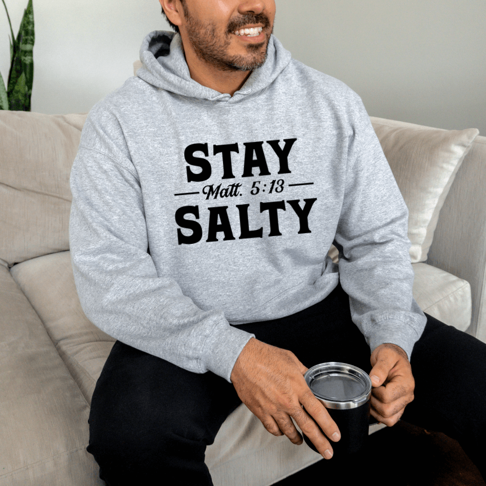 Stay Salty Hoodie sport grey. On the front is printed "Stay Salty Matt. 5:13" in large black font.
