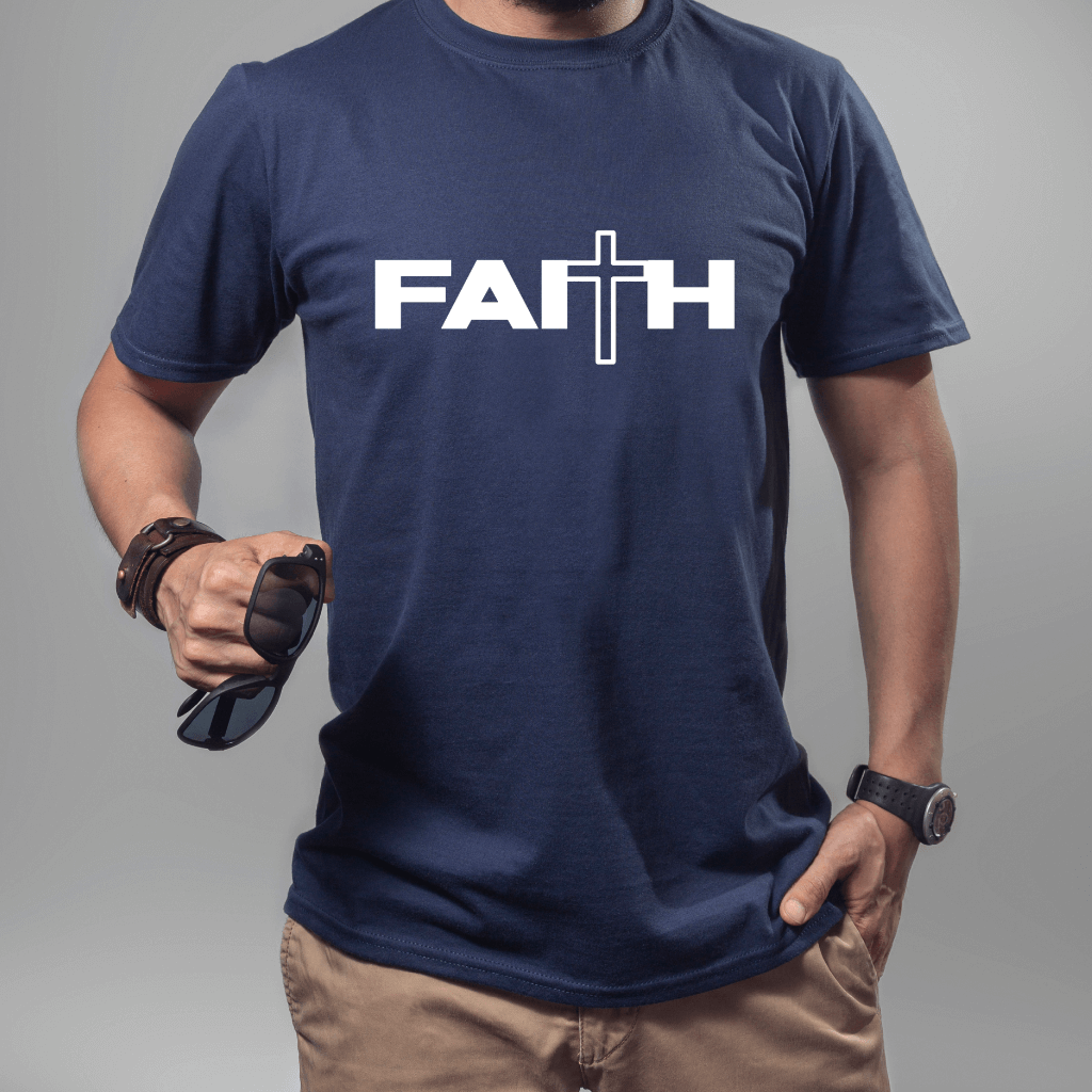 Unisex Faith T-shirt navy, short sleeve. "Faith" is printed in white font on the front chest. A cross is in place of the "t'.