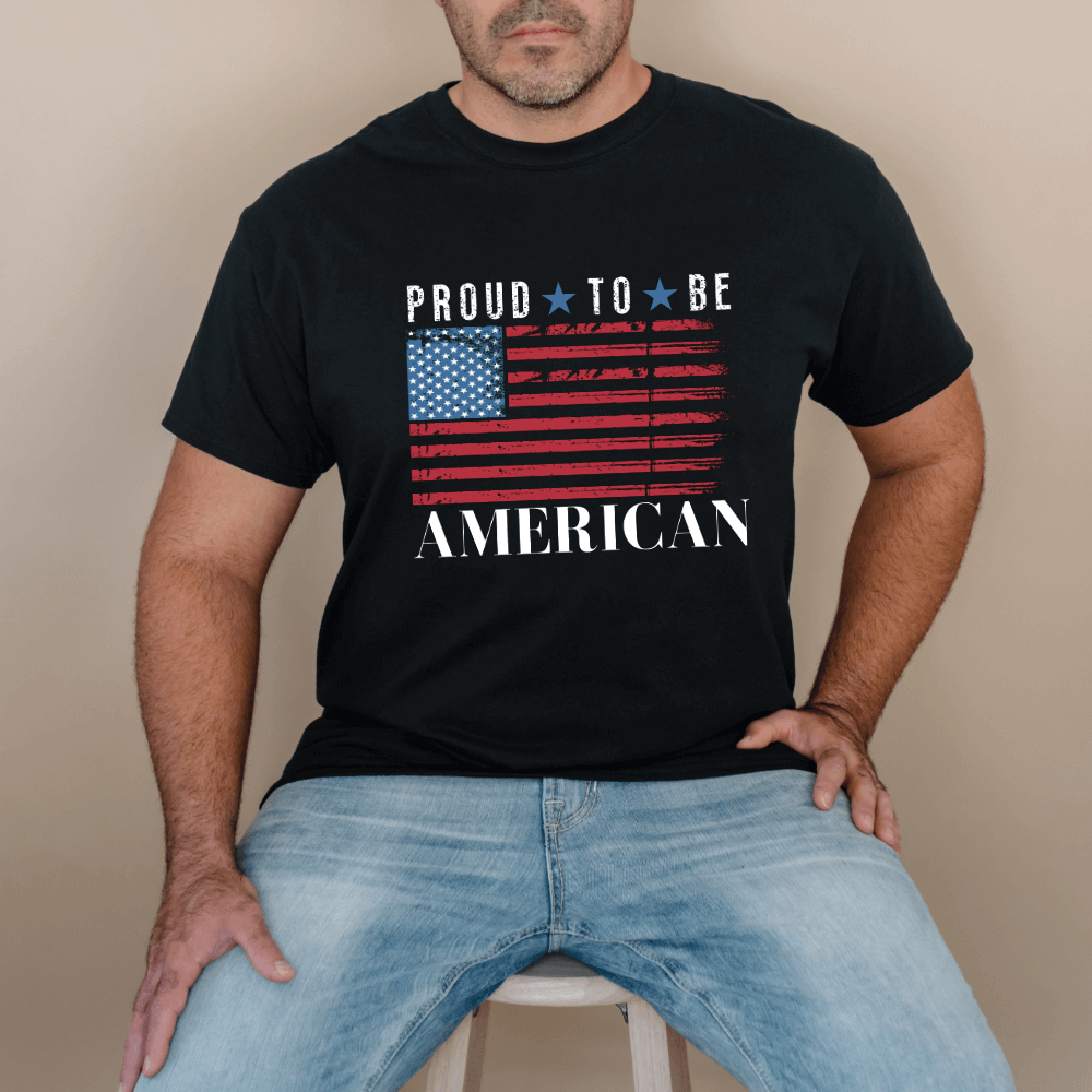 Men's Proud to Be American Shirt - black.  American flag design printed on front chest with "Proud To Be American" printed in white above and below the flag. 