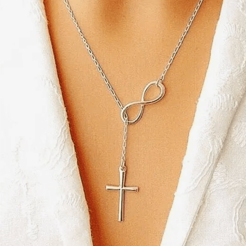 Sterling silver cross necklace with infinity charm